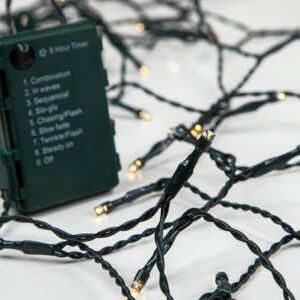 ΣΕΙΡΑ, 96 LED 5mm, ΜΠΑΤΑΡΙΑΣ 3xAA, 8 ΠΡΟΓΡΑΜΜΑΤΑ, ΧΡΟΝΟΔΙΑΚΟΠΤΗΣ, ΠΡΑΣΙΝΟ PVC ΚΑΛΩΔΙΟ, ΘΕΡΜΟ ΛΕΥΚΟ LED ANA 10cm, ΠΡΟΕΚΤΑΣΗ ΠΑΡΟΧΗΣ 1m, ΙΡ44 - Image 1